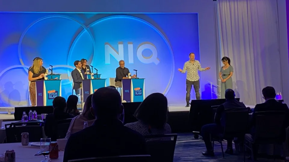 Damian Gayler pitching NIQ Universe to senior leaders at NIQ's Culture Slam in Orlando